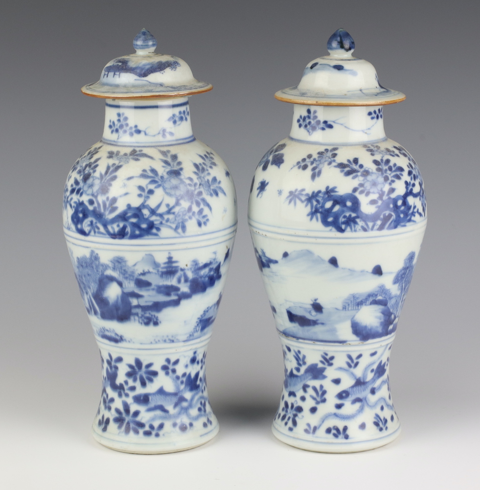 A pair of 19th Century Chinese blue and white oviform vases and covers decorated with a band of a - Image 2 of 6