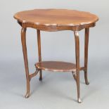 An Edwardian oval inlaid mahogany 2 tier occasional table raised on cabriole supports 69cm h x