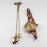 A lady's 9ct yellow gold wristwatch and bracelet 18cm, together with 2 pendants and a chain 40cm