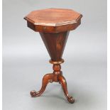 A Victorian octagonal rosewood work table of conical form with hinged lid, raised on tripod base