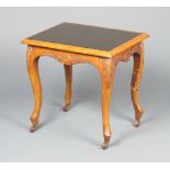 A Victorian rectangular carved oak occasional table with inset mirror panelled top, raised on