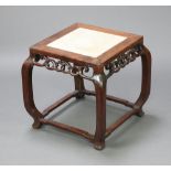 A 19th Century square Chinese pierced hardwood jardiniere stand with white veined marble top, raised