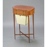 A Regency octagonal crossbanded rosewood work table fitted 2 drawers with deep basket raised on