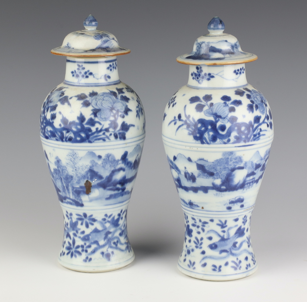 A pair of 19th Century Chinese blue and white oviform vases and covers decorated with a band of a - Image 6 of 6