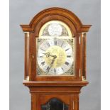 A reproduction Georgian style chiming longcase clock, the 20cm arched gilt dial with silvered