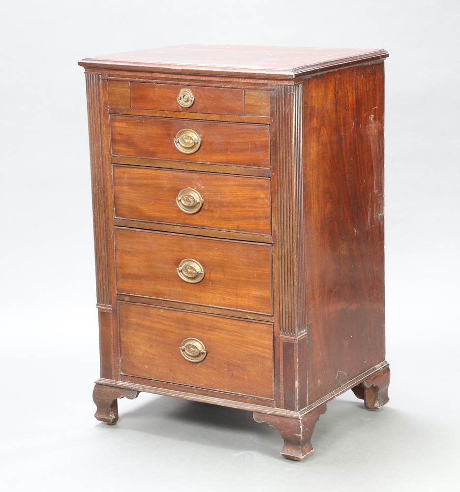 A 19th Century Continental mahogany pedestal chest with crossbanded inlaid mahogany top above 5