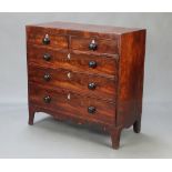 A William IV mahogany chest of 2 short and 3 long drawers with ivory escutcheons and turned ebony