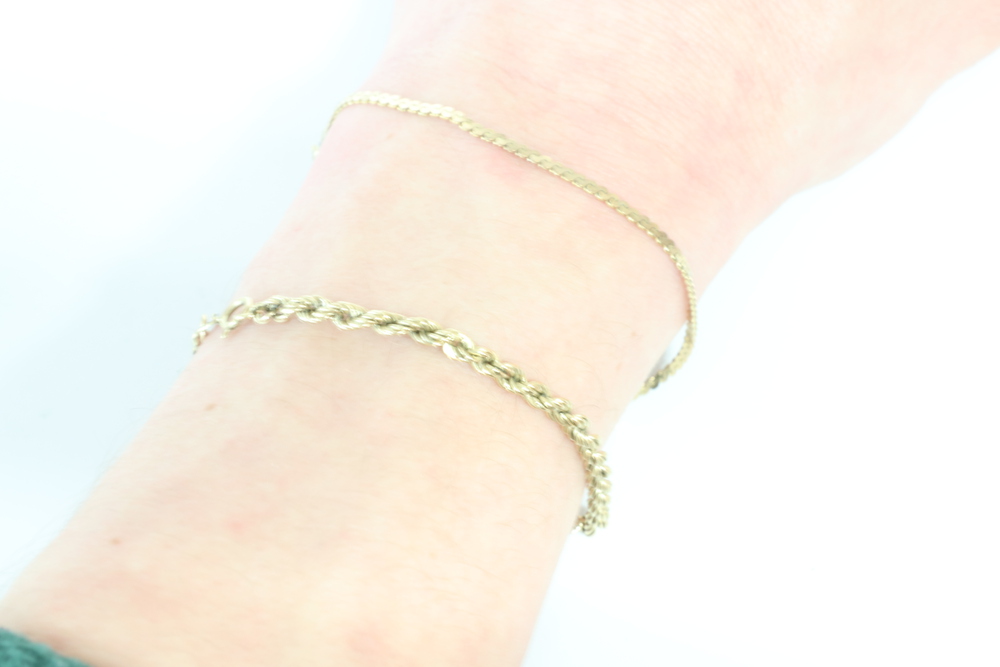 A 9ct yellow gold bracelet 17cm a flat link ditto 18cm and a necklace 40cm 7.2 grams - Image 3 of 3