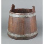A circular coopered oak pail 28cm x 24cm