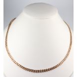 A yellow metal 9K flat link necklace 10.9 grams, 50cm