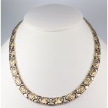 A 9ct two colour gold necklace 31 grams, 42cm