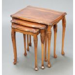 A nest of 3 Chippendale style rectangular carved mahogany interfitting coffee tables with plate