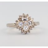 A white metal 18ct diamond cluster ring 5.3 grams, size N, approx. 1ct