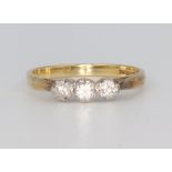 An 18ct yellow gold 3 stone diamond ring approx. 0.25ct, size N