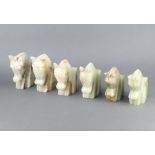 Four pairs of carved onyx bookends in the form of horses heads 14cm x 10cm x 6cm, 15cm x 6cm x