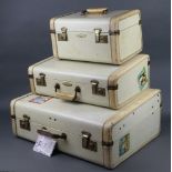 Flite 69, a suite of 1950's luggage comprising vanity case with gilt mounts and luggage label marked