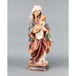 Toni Baur, 20th Century carved figure of The Standing Virgin Mary and Infant Christ, 57cm h x 16cm w