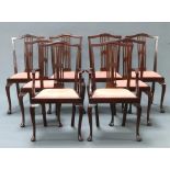 A set of 8 Edwardian Hepplewhite style mahogany slat back dining chairs with pierced slat backs