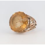 A yellow metal smoky quartz dress ring, 11 grams, size L