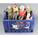 A collection of 4 Action Man figures together with numerous outfits including Guardsman and