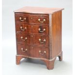 A mahogany Georgian style serpentine fronted chest with brushing slide above 4 long drawers,