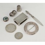 A silver Cymric brooch, a silver match sleeve, bookmark, 2 thimbles etc