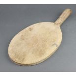 Robert Thomas, a carved oak Mouseman cheeseboard, the handle carved a mouse 2cm h x 38cm w x 18cm