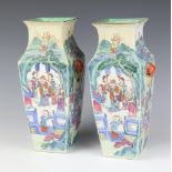 A pair of 19th Century Qing Period Cantonese square tapered vases with red and gilt lion mask ring