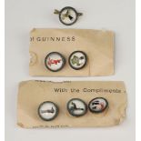 Six Guinness advertising buttons