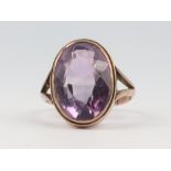 A 9ct yellow gold oval amethyst ring, size J, 6.8 grams