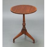 A circular inlaid and crossbanded mahogany wine table, raised on pillar and tripod base 57cm h x