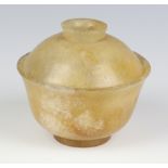 A 19th Century Qing Dynasty beige hardstone bowl and cover with slightly spreading foot and a