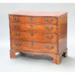 A George III mahogany chest of serpentine outline, fitted 4 long drawers with original pierced