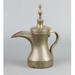 An Arabic Dallah coffee pot with oval mark to side 26cm x 11cm