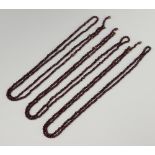 Three strings of garnet bead necklaces, each 110cm long