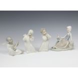 A Lladro figure of a seated angel musician 11cm, a standing ditto 16cm, another 15cm and a lady