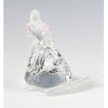A Swarovski Crystal figure of Cinderella and her shoe 9cm boxed