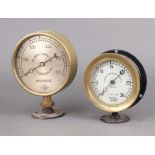 Oil Well Supply Company, a circular steel and brass pressure gauge marked Oil Supply Company