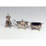 A silver 3 piece condiment set raised on pad feet London 1966, 130 grams