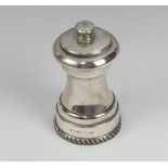 A silver mounted peppermill Birmingham 1976