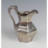 A Victorian Irish silver hexagonal jug with rustic handle and engraved monogram Dublin 1848, 297