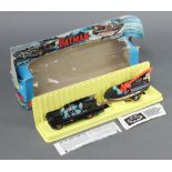 A 1st edition Corgi Gift Set no 3 "Batman Rocket Firing Batmobile with Bat Boat and Trailer"'