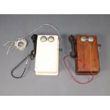 A wall mounted internal telephone contained in a mahogany case 37cm x 20cm x 11cm and 1 other in a