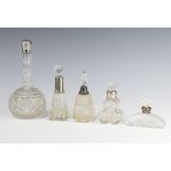 A Victorian cut glass silver mounted scent bottle Birmingham 1890 19cm, 4 other mounted bottles