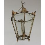 A Georgian style gilt metal hall lantern with glass panels to the sides 31cm x 33cm One glass
