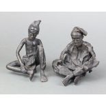 Two Benin bronze figures of seated tribesman 13cm x 12cm x 10cm