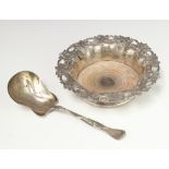 A Sterling silver serving spoon 75 grams, a plated repousse champagne coaster