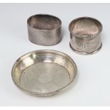 An engine turned silver nut dish Birmingham 1946, 2 napkin rings, 116 grams The dish is dented
