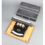 A Gundka no.5 manual typewriter with carrying case