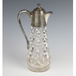 A cut glass silver mounted ewer with S scroll handle and hobnail decoration Sheffield 1912 28cm